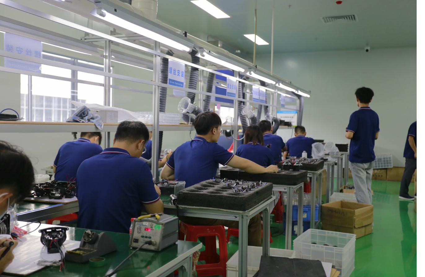 NVEL Assembly Line Workers